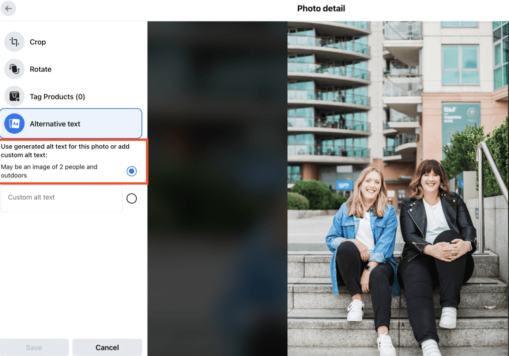 Screenshot showing how to add ALT Text on Facebook. The automated ALT Text says May be an image of 2 people and outdoors. The image shows the two Lauras sitting on some outside steps. Both are wearing dark jeans and they look happy. There is a building behind them.