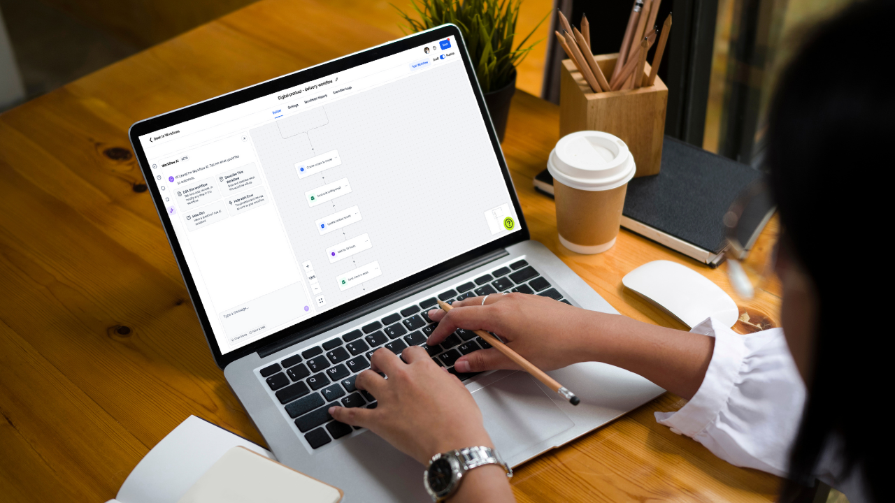 Freelancer setting up email automations on laptop, showing migration from MailerLite to Hubsy.